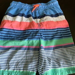 Oshkosh striped swim trunks.